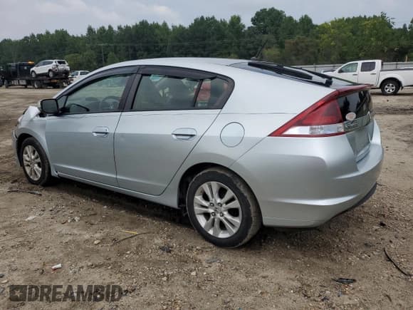 ✅ 2012 Honda Insight EX • VIN: JHMZE2H79CS004934 • Лот: 67858765. Опубликован ранее на Copart с пробегом 148 241 миль. Бесплатный доступ к архиву аукционных продаж из США и подробный отчёт об истории автомобиля на DreamBid. Изображение 2.