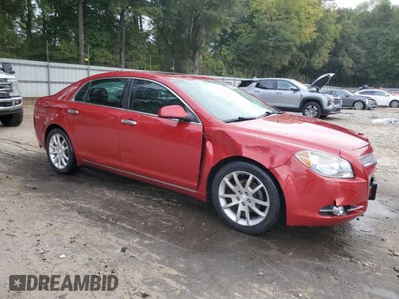 ✅ 2012 Chevrolet Malibu LTZ 1LZ • VIN: 1G1ZE5E0XCF257790 • Lot: 85523035. Listed on Copart with 166,269 mi. Free auction sales archive from the USA and detailed vehicle history report at DreamBid. Image 4.