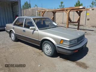 ✅ 1986 Nissan Maxima • VIN: JN1HU11S5GT145169 • Лот: 42472765. Опубликован ранее на IAAI с пробегом 173 183 миль. Бесплатный доступ к архиву аукционных продаж из США и подробный отчёт об истории автомобиля на DreamBid. Изображение 1.