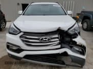 ✅ 2017 Hyundai Santa Fe 2.4L • VIN: 5XYZUDLB4HG418390 • Лот: 55275014. Опубликован ранее на Copart с пробегом 69 981 миль. Бесплатный доступ к архиву аукционных продаж из США и подробный отчёт об истории автомобиля на DreamBid. Изображение 5.