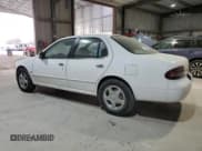 ✅ 1997 Nissan Altima XE • VIN: 1N4BU31D2VC153538 • Lot: 92502105. Listed on Copart with 146,779 mi. Free auction sales archive from the USA and detailed vehicle history report at DreamBid. Image 2.