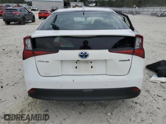 ✅ 2022 Toyota Prius LE • VIN: JTDKAMFU6N3182140 • Lot: 82677565. Wystawiony na Copart z przebiegiem 79 813 mil. Bezpłatny archiwum sprzedaży aukcyjnych z USA i szczegółowy raport historii pojazdu na DreamBid. Zdjęcie 6.