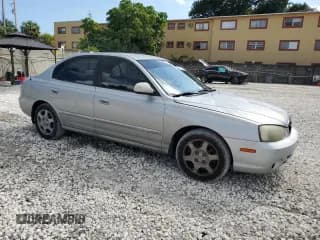 ✅ 2003 Hyundai Elantra GLS • VIN: KMHDN45D33U574719 • Lot: 91365165. Listed on Copart with 110,075 mi. Free auction sales archive from the USA and detailed vehicle history report at DreamBid. Image 4.