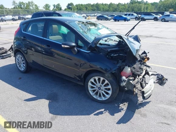 ✅ 2017 Ford Fiesta Titanium • VIN: 3FADP4FJ3HM123942 • Лот: 42861407. Опубликован ранее на IAAI с пробегом 105 051 миль. Бесплатный доступ к архиву аукционных продаж из США и подробный отчёт об истории автомобиля на DreamBid. Изображение 1.
