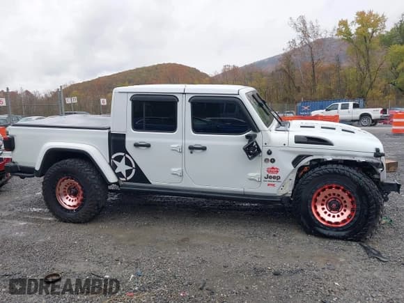 ✅ 2021 Jeep Gladiator Rubicon • VIN: 1C6JJTBM0ML533240 • Lot: 43528034. Listed on IAAI with 67,598 mi. Free auction sales archive from the USA and detailed vehicle history report at DreamBid. Image 14.
