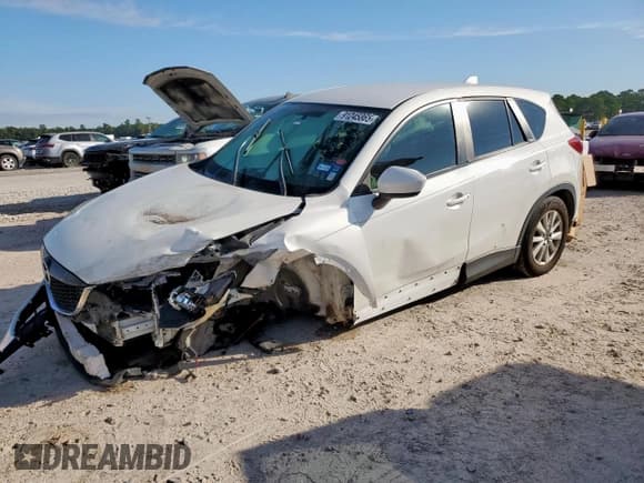 ✅ 2014 Mazda CX-5 Sport • VIN: JM3KE2BE6E0335437 • Lot: 91245865. Listed on Copart with 160,818 mi. Free auction sales archive from the USA and detailed vehicle history report at DreamBid. Image 5.