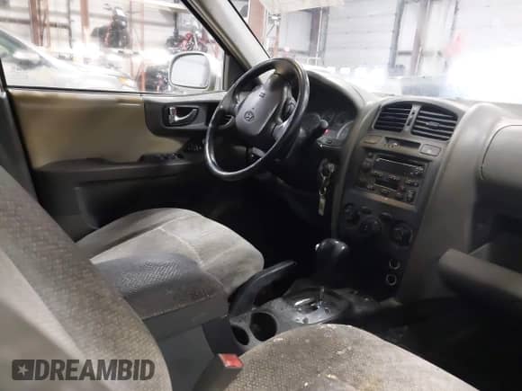 2005 Hyundai Santa Fe GLS z VIN KM8SC73D35U872868, wystawiony jako IAAI lot #41743487 z przebiegiem 215 408 mil mil oraz . Historia ofert i sprzedaży dostępna na DreamBid. Obrazek 5.