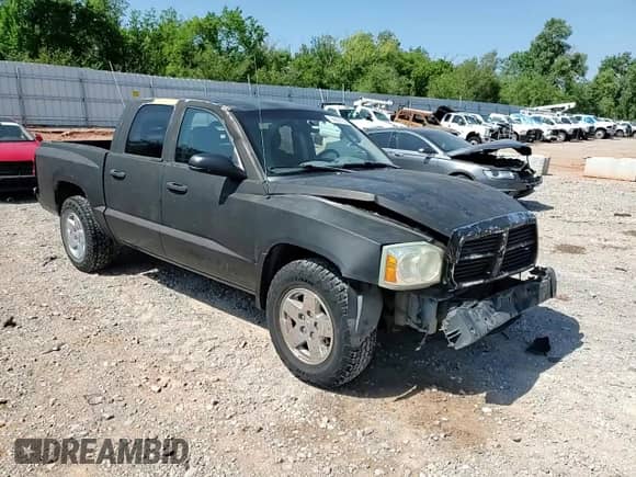 2005 Dodge Dakota SLT z VIN 1D7HE48N85S271093, wystawiony jako Copart lot #65622765 z przebiegiem 157 344 mil mil oraz Szkoda całkowita • Salvage title. Historia ofert i sprzedaży dostępna na DreamBid. Obrazek 14.