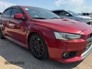 ✅ 2012 Mitsubishi Lancer Evolution GSR • VIN: JA32W8FV0CU019216 • Lot: 75898944. Listed on Copart with 129,387 mi. Free auction sales archive from the USA and detailed vehicle history report at DreamBid. Image 1.