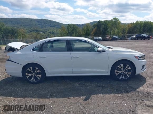 ✅ 2021 Volkswagen Passat SE • VIN: 1VWSA7A32MC003295 • Lot: 43311970. Listed on IAAI with 26,869 mi. Free auction sales archive from the USA and detailed vehicle history report at DreamBid. Image 14.