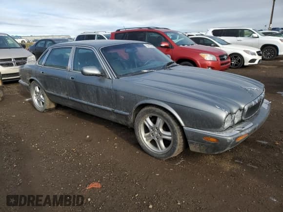 ✅ 2002 Jaguar XJ • VIN: SAJFA12C72LF47096 • Лот: 79412794. Опубликован ранее на Copart с пробегом 287 060 миль. Бесплатный доступ к архиву аукционных продаж из США и подробный отчёт об истории автомобиля на DreamBid. Изображение 4.