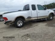 ✅ 1999 Ford F-150 • VIN: 1FTRX07W6XKA93036 • Lot: 46498755. Wystawiony na Copart z przebiegiem 354 328 mil. Bezpłatny archiwum sprzedaży aukcyjnych z USA i szczegółowy raport historii pojazdu na DreamBid. Zdjęcie 3.