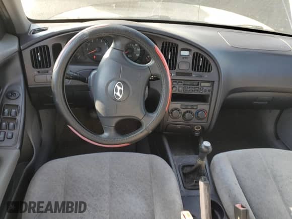 2004 Hyundai Elantra GLS z VIN KMHDN46D34U807515, wystawiony jako Copart lot #72676224 z przebiegiem 66 584 mil mil oraz Czysty tytuł • Clean title. Historia ofert i sprzedaży dostępna na DreamBid. Obrazek 8.