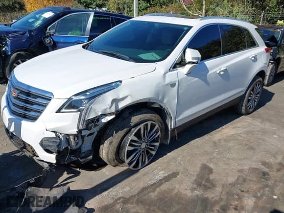 ✅ 2018 Cadillac XT5 Premium Luxury FWD • VIN: 1GYKNERS8JZ157472 • Lot: 43597067. Listed on IAAI with 76,473 mi. Free auction sales archive from the USA and detailed vehicle history report at DreamBid. Image 2.