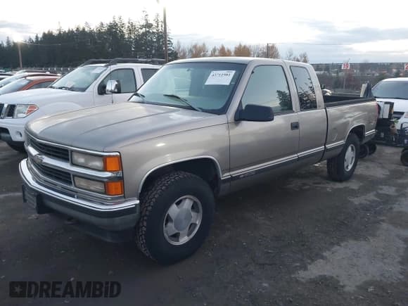✅ 1998 Chevrolet Silverado 1500 • VIN: 2GCEK19R1W1280841 • Lot: 43711981. Listed on IAAI with 257,693 mi. Free auction sales archive from the USA and detailed vehicle history report at DreamBid. Image 2.
