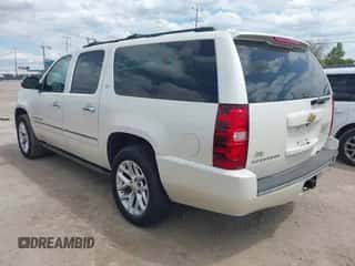 2013 Chevrolet Suburban LTZ z VIN 1GNSKKE74DR342029, wystawiony jako IAAI lot #43313086 z przebiegiem 137 137 mil mil oraz . Historia ofert i sprzedaży dostępna na DreamBid. Obrazek 3.