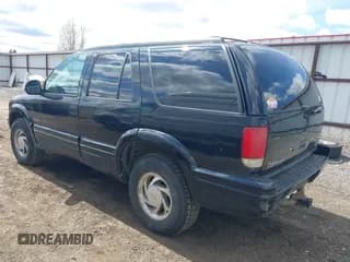 ✅ 1997 Oldsmobile Bravada • VIN: 1GHDT13W3V2707243 • Lot: 42024114. Listed on IAAI with 185,219 mi. Free auction sales archive from the USA and detailed vehicle history report at DreamBid. Image 3.
