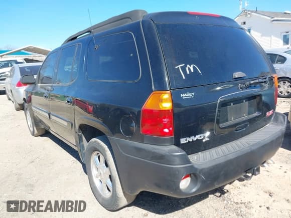 ✅ 2003 GMC Envoy SLE • VIN: 1GKES16S836125753 • Lot: 41703472. Listed on IAAI with 313,686 mi. Free auction sales archive from the USA and detailed vehicle history report at DreamBid. Image 3.