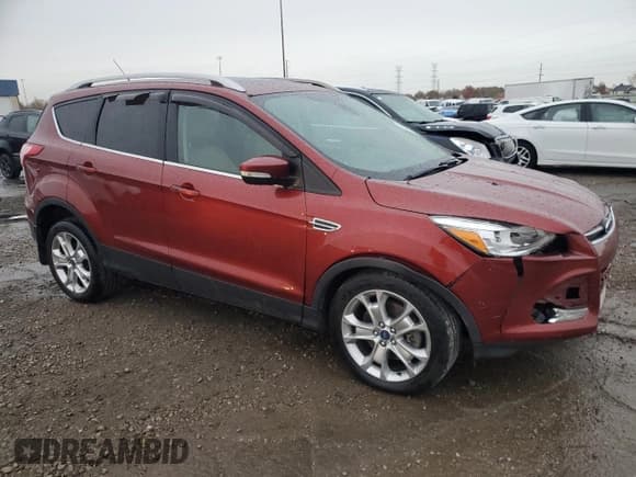 ✅ 2015 Ford Escape Titanium • VIN: 1FMCU9JX6FUA98241 • Lot: 90685515. Listed on Copart with 128,685 mi. Free auction sales archive from the USA and detailed vehicle history report at DreamBid. Image 4.
