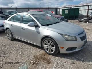 2013 Chevrolet Cruze LTZ z VIN 1G1PG5SBXD7192278, wystawiony jako IAAI lot #43391857 z przebiegiem 86 808 mil mil oraz . Historia ofert i sprzedaży dostępna na DreamBid. Obrazek 1.