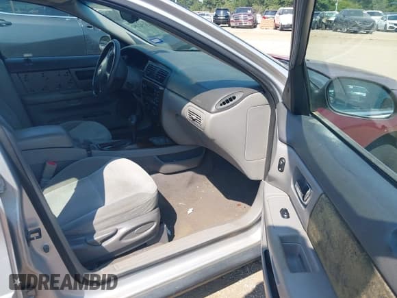 ✅ 2002 Mercury Sable GS • VIN: 1MEFM50U92A644879 • Lot: 43232792. Listed on IAAI with 150,165 mi. Free auction sales archive from the USA and detailed vehicle history report at DreamBid. Image 5.