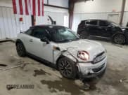 ✅ 2013 MINI Coupe • VIN: WMWSX1C50DT507354 • Lot: 48070765. Listed on Copart with 98,830 mi. Free auction sales archive from the USA and detailed vehicle history report at DreamBid. Image 4.