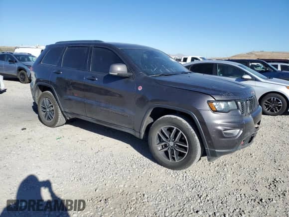 2018 Jeep Grand Cherokee Trailhawk с VIN 1C4RJFLT9JC122630, выставлен на аукционе Copart как лот 81750945 с пробегом 200 960 миль миль и Списание • Salvage title. История ставок и продаж доступна на DreamBid. Изображение 4.