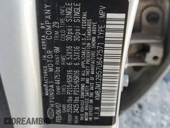 2007 Hyundai Tucson GLS z VIN KM8JM12B57U647571, wystawiony jako Copart lot #79515164 z przebiegiem Nie podano mil oraz Szkoda całkowita • Salvage title. Historia ofert i sprzedaży dostępna na DreamBid. Obrazek 16.