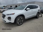 ✅ 2020 Hyundai Santa Fe SEL • VIN: 5NMS33AA7LH191834 • Lot: 59259894. Wystawiony na Copart z przebiegiem 38 898 mil. Bezpłatny archiwum sprzedaży aukcyjnych z USA i szczegółowy raport historii pojazdu na DreamBid. Zdjęcie 1.