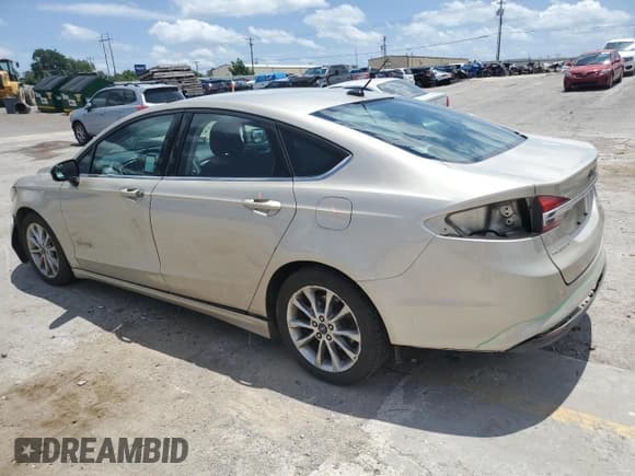 ✅ 2017 Ford Fusion Hybrid SE • VIN: 3FA6P0LU7HR355219 • Лот: 62288355. Опубликован ранее на Copart с пробегом 155 347 миль. Бесплатный доступ к архиву аукционных продаж из США и подробный отчёт об истории автомобиля на DreamBid. Изображение 2.