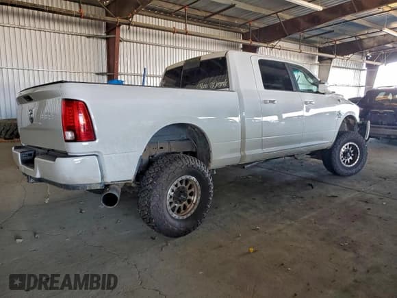 ✅ 2015 Ram 2500 SLT • VIN: 3C6UR5MLXFG513972 • Lot: 94088695. Wystawiony na Copart z przebiegiem 211 938 mil. Bezpłatny archiwum sprzedaży aukcyjnych z USA i szczegółowy raport historii pojazdu na DreamBid. Zdjęcie 3.