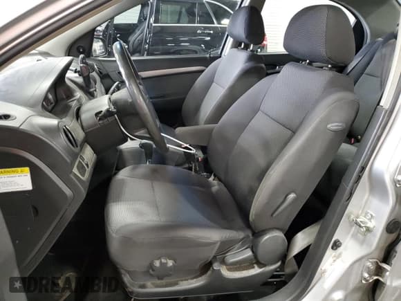 ✅ 2007 Chevrolet Aveo LS • VIN: KL1TD56657B162044 • Lot: 49995865. Wystawiony na Copart z przebiegiem 124 610 mil. Bezpłatny archiwum sprzedaży aukcyjnych z USA i szczegółowy raport historii pojazdu na DreamBid. Zdjęcie 7.