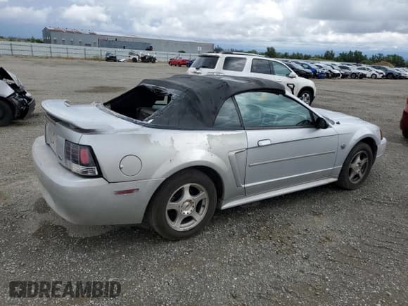 ✅ 2004 Ford Mustang Deluxe • VIN: 1FAFP44494F117692 • Lot: 56503755. Listed on Copart with 159,917 mi. Free auction sales archive from the USA and detailed vehicle history report at DreamBid. Image 3.