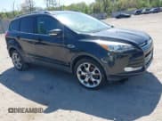✅ 2013 Ford Escape Titanium • VIN: 1FMCU9J96DUC07330 • Lot: 42123720. Listed on IAAI with 51,473 mi. Free auction sales archive from the USA and detailed vehicle history report at DreamBid. Image 1.