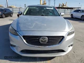 ✅ 2016 Mazda 6 i Grand Touring • VIN: JM1GJ1W55G1437923 • Лот: 84768675. Опубликован ранее на Copart с пробегом 181 509 миль. Бесплатный доступ к архиву аукционных продаж из США и подробный отчёт об истории автомобиля на DreamBid. Изображение 5.
