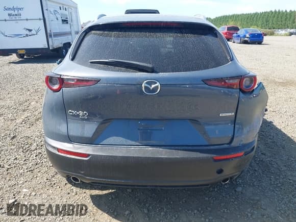 ✅ 2022 Mazda CX-30 S Carbon Edition • VIN: 3MVDMBCL8NM422737 • Lot: 42229336. Listed on IAAI with 14,665 mi. Free auction sales archive from the USA and detailed vehicle history report at DreamBid. Image 16.