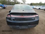 ✅ 2013 Lincoln MKZ • VIN: 3LN6L2G92DR817831 • Lot: 86621005. Wystawiony na Copart z przebiegiem 179 625 mil. Bezpłatny archiwum sprzedaży aukcyjnych z USA i szczegółowy raport historii pojazdu na DreamBid. Zdjęcie 6.