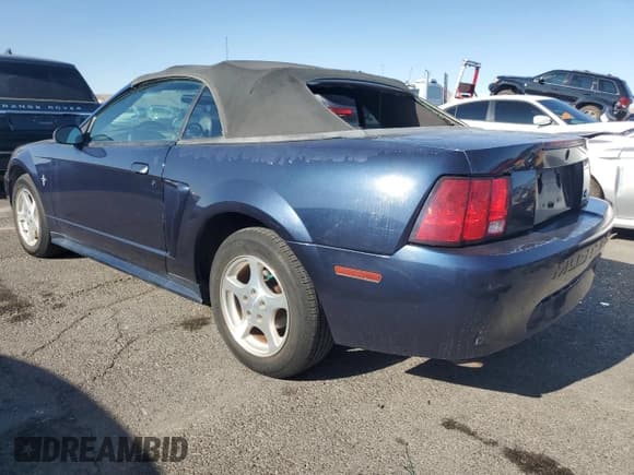 ✅ 2002 Ford Mustang Deluxe • VIN: 1FAFP44462F126797 • Lot: 80134015. Listed on Copart with Not provided. Free auction sales archive from the USA and detailed vehicle history report at DreamBid. Image 2.