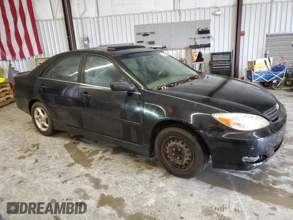 ✅ 2003 Toyota Camry SE • VIN: JTDBE32K830240816 • Lot: 90244385. Listed on Copart with 319,607 mi. Free auction sales archive from the USA and detailed vehicle history report at DreamBid. Image 4.