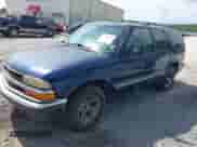 2000 Chevrolet Blazer LS z VIN 1GNCS13W3YK144615, wystawiony jako IAAI lot #42549560 z przebiegiem 203 875 mil mil oraz . Historia ofert i sprzedaży dostępna na DreamBid. Obrazek 2.