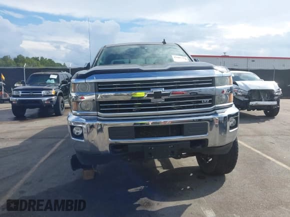 ✅ 2015 Chevrolet Silverado 2500HD LTZ • VIN: 1GC1KWE84FF609940 • Lot: 43407719. Listed on IAAI with 165,422 mi. Free auction sales archive from the USA and detailed vehicle history report at DreamBid. Image 12.