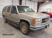 ✅ 1999 GMC Suburban • VIN: 3GKFK16R6XG537871 • Лот: 42745417. Опубликован ранее на IAAI с пробегом 260 752 миль. Бесплатный доступ к архиву аукционных продаж из США и подробный отчёт об истории автомобиля на DreamBid. Изображение 1.