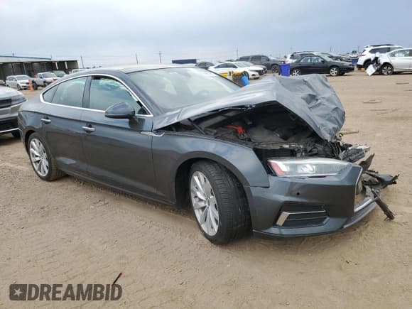 ✅ 2018 Audi A5 Sportback Premium Plus • VIN: WAUBNDF54JA025318 • Лот: 69009675. Опубликован ранее на Copart с пробегом 89 118 миль. Бесплатный доступ к архиву аукционных продаж из США и подробный отчёт об истории автомобиля на DreamBid. Изображение 4.