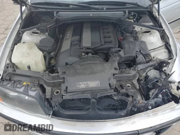 2000 BMW 3 Series 323i with VIN WBAAM3335YCA86464, listed as a Copart auction lot 61687574 with 151,447 mi miles and Salvage title. Bid and sale history available at DreamBid. Image 11.