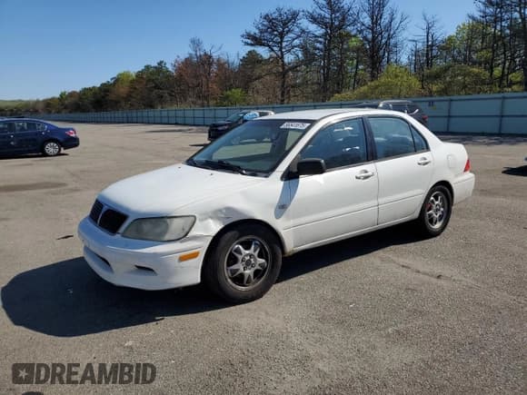 ✅ 2003 Mitsubishi Lancer ES • VIN: JA3AJ26E83U076335 • Лот: 67506825. Опубликован ранее на Copart с пробегом 143 394 миль. Бесплатный доступ к архиву аукционных продаж из США и подробный отчёт об истории автомобиля на DreamBid. Изображение 1.