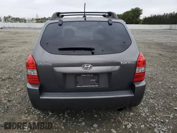 2009 Hyundai Tucson GLS z VIN KM8JM12B39U952327, wystawiony jako Copart lot #73695884 z przebiegiem 142 752 mil mil oraz Szkoda całkowita • Salvage title. Historia ofert i sprzedaży dostępna na DreamBid. Obrazek 6.