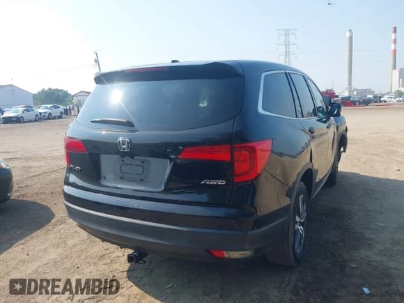 ✅ 2017 Honda Pilot EX-L • VIN: 5FNYF6H57HB032784 • Lot: 42893011. Listed on IAAI with 125,407 mi. Free auction sales archive from the USA and detailed vehicle history report at DreamBid. Image 4.