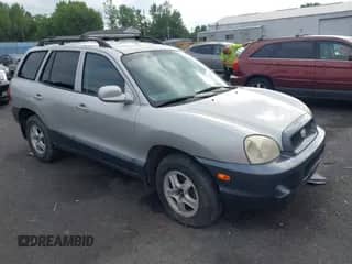 2002 Hyundai Santa Fe GLS z VIN KM8SC73D82U187325, wystawiony jako IAAI lot #42828065 z przebiegiem 178 633 mil mil oraz . Historia ofert i sprzedaży dostępna na DreamBid. Obrazek 1.