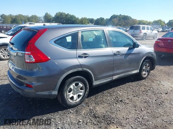 ✅ 2016 Honda CR-V LX • VIN: 3CZRM3H39GG704869 • Lot: 43588432. Listed on IAAI with 105,234 mi. Free auction sales archive from the USA and detailed vehicle history report at DreamBid. Image 4.