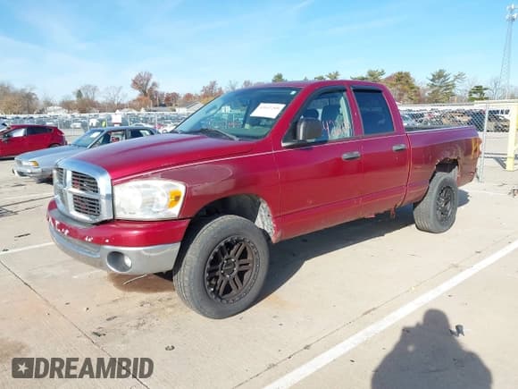 ✅ 2007 Dodge 1500 SLT • VIN: 1D7HU18267S220752 • Lot: 43642209. Listed on IAAI with 206,579 mi. Free auction sales archive from the USA and detailed vehicle history report at DreamBid. Image 2.